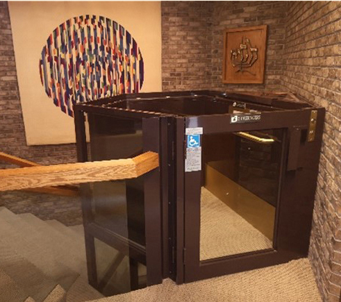 A picture containing text, floor, indoor, table Description automatically generated